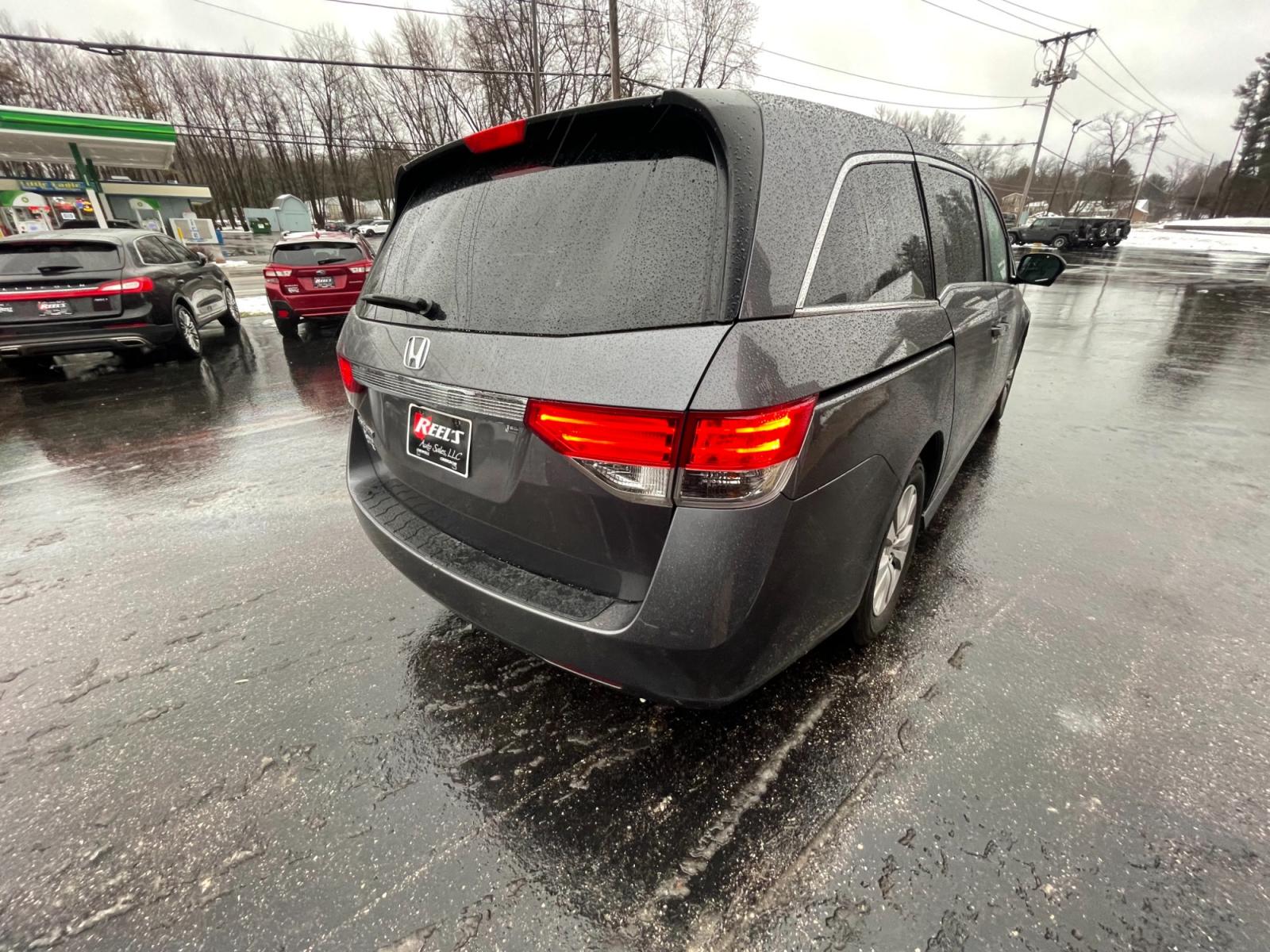 2016 Gray /Gray Honda Odyssey EX-L (5FNRL5H61GB) with an 3.5L V6 SOHC 24V engine, 6A transmission, located at 11115 Chardon Rd. , Chardon, OH, 44024, (440) 214-9705, 41.580246, -81.241943 - This 2016 Honda Odyssey EX-L is a versatile and comfortable minivan equipped with a 3.5-liter V6 engine paired with a 6-speed automatic transmission, providing a smooth driving experience. It's designed with convenience and luxury in mind, evident in features such as heated leather seats, power-adju - Photo #7